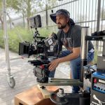 profile picture of Elias on a dolly. With a passion for visual storytelling Dubai DOP Elias has lent his talents to films, commercials and high-end social media campaigns