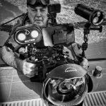 Picture of Glen Donaldson top focus puller in Dubai with underwater camera at a Dubai Olympic pool.