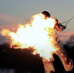 Picture of Stunt Fireman Niccolo doing a burn out suit.