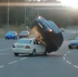 A picture of a Ranger Rover being flipped for films