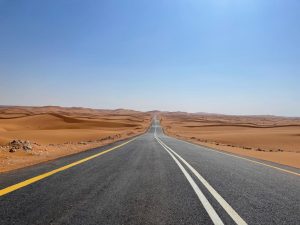 Picture of desert road. Where roads fade into red sands — Desert Road Film Location in Riyadh. Classic car reveals & desert vistas.