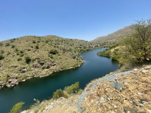 River view image. Saudi River Film Location: lush greenery, flowing water & kayak scenes in Saudi Arabia. Easy access, ideal for family, student & camping shoots.